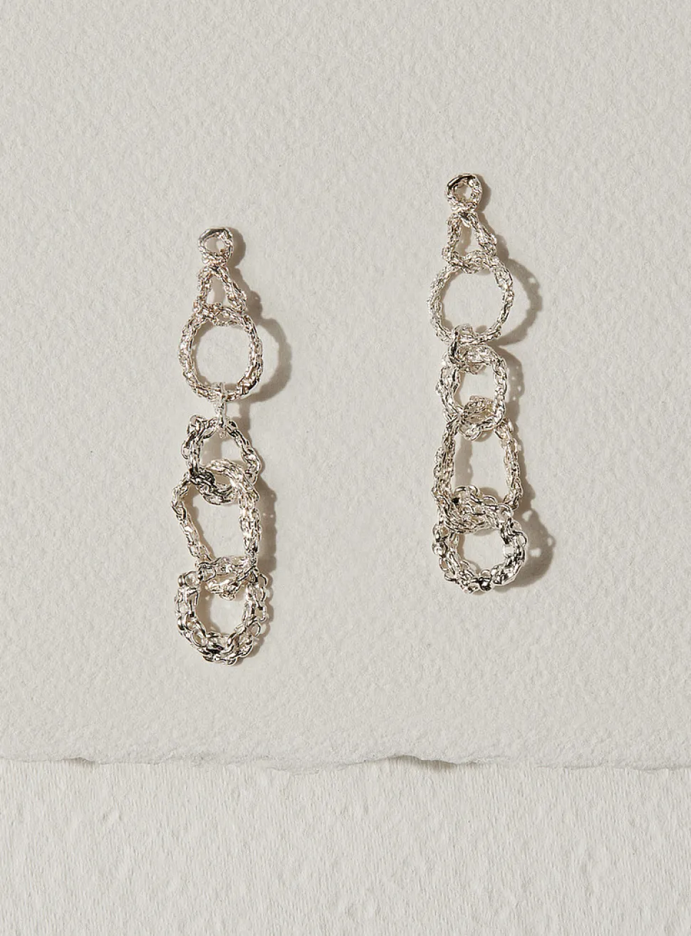 Assembly sterling silver earrings