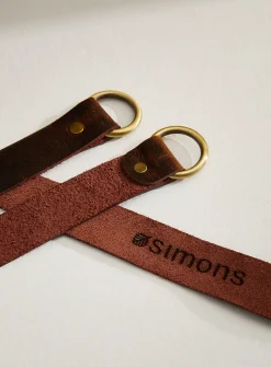 Brown leather curtain holders