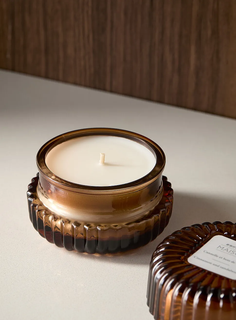 Cinnamon and sandalwood scented candle