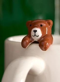 Climbing bear cub mug