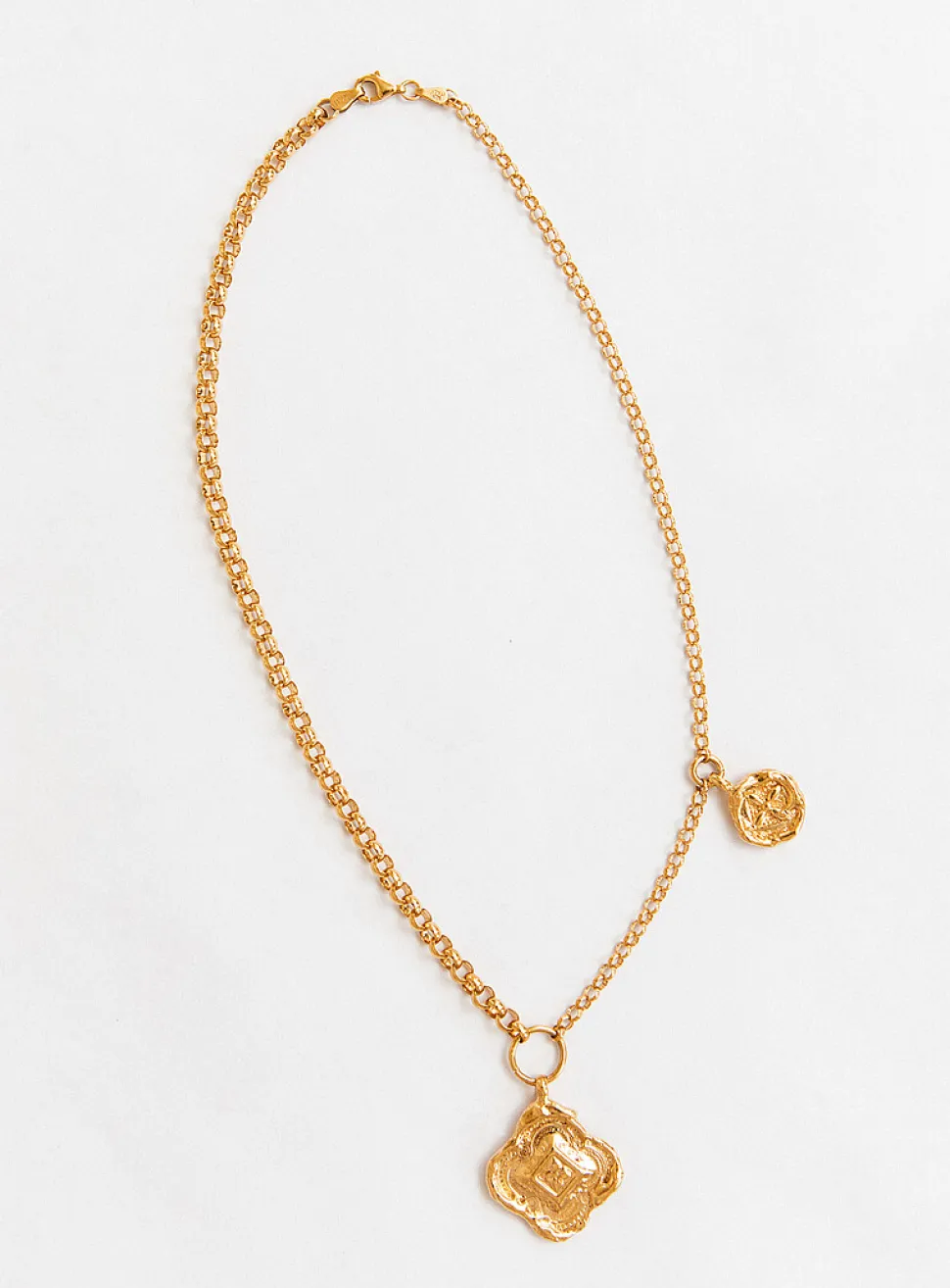 Colliding compass necklace