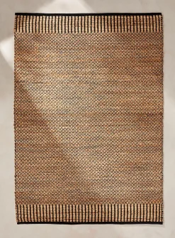 Contrasting trim jute artisanal rug