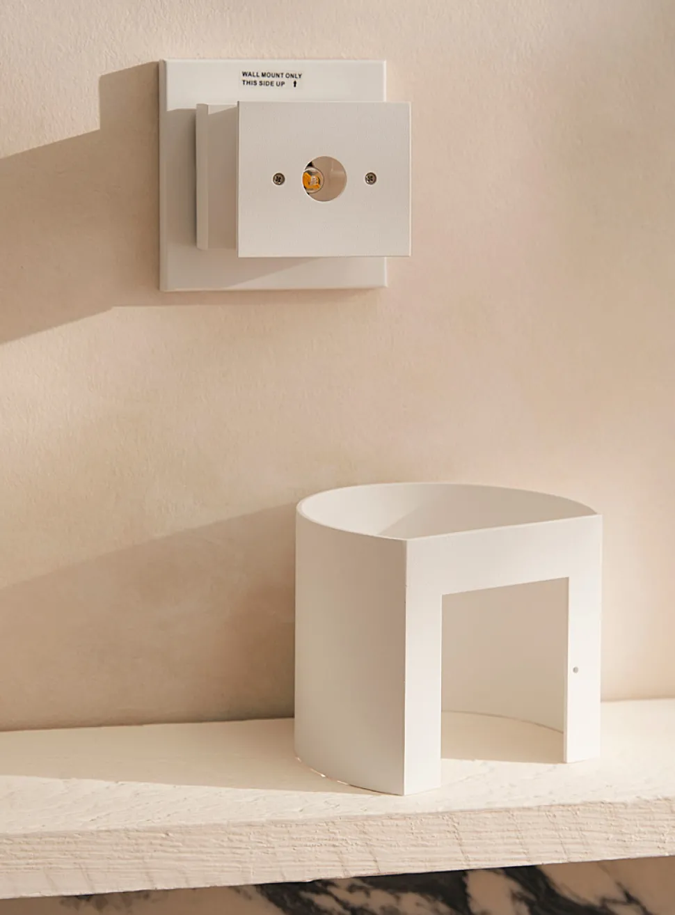 Curved modern sconce