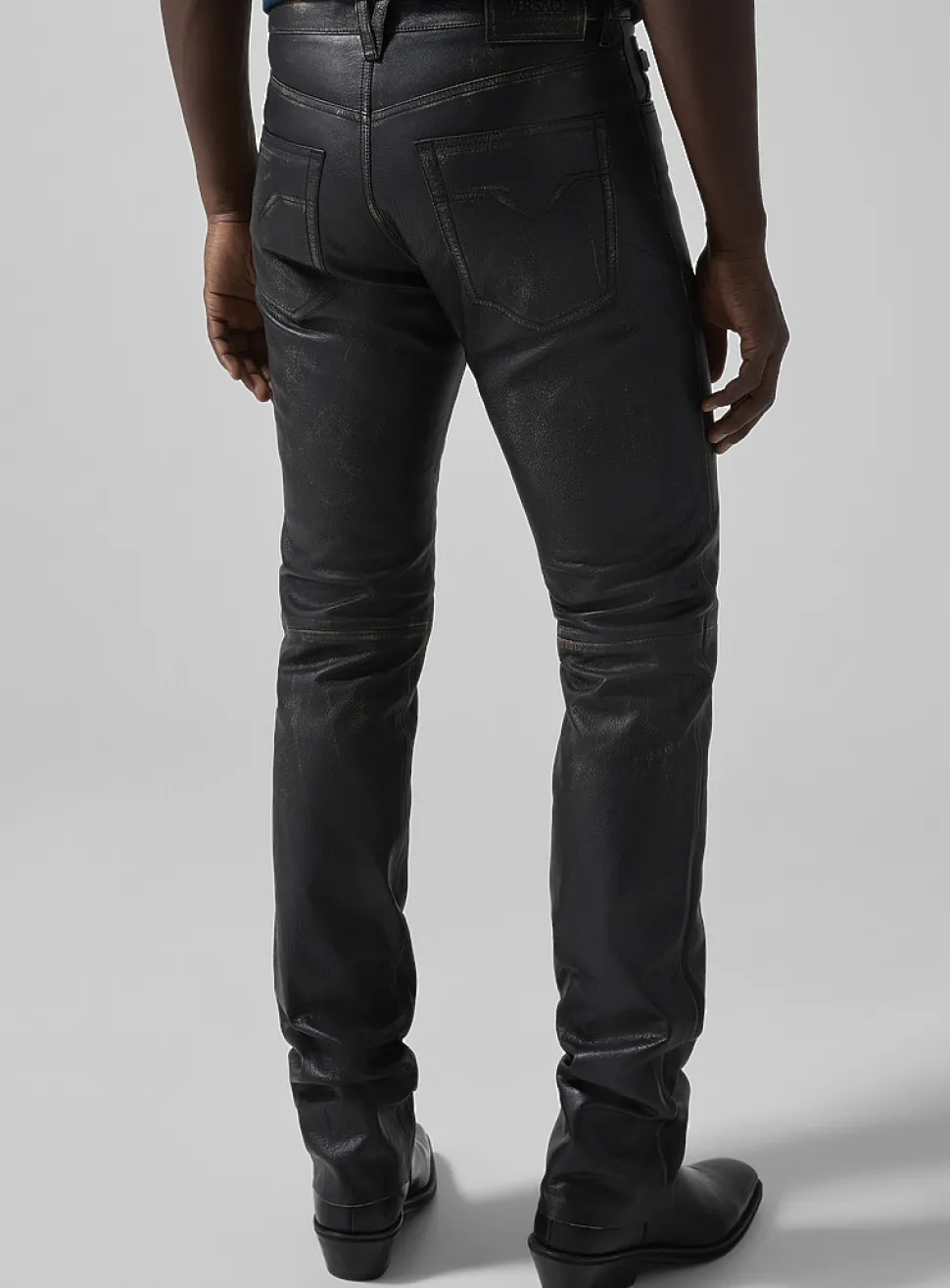 Distressed fitted grained leather pant