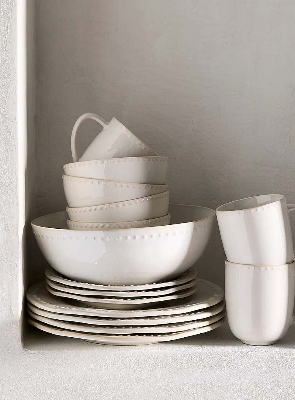 Embossed polka dots white mug