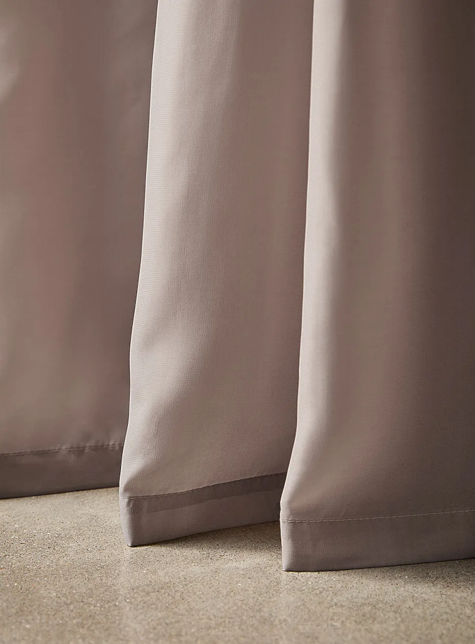 Extra-long neutral-coloured sheer curtain