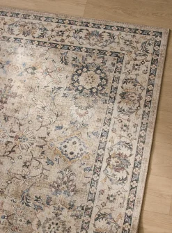 Faded floral fresco rug