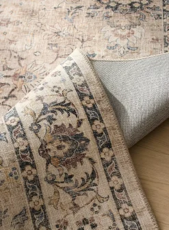 Faded floral fresco rug