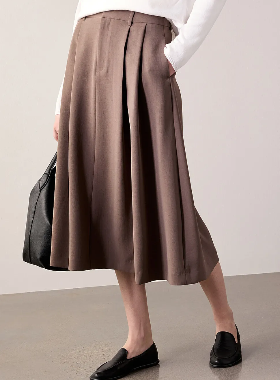 Flared textured crepe pleated skirt