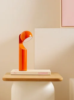 Geometric articulated portable lamp