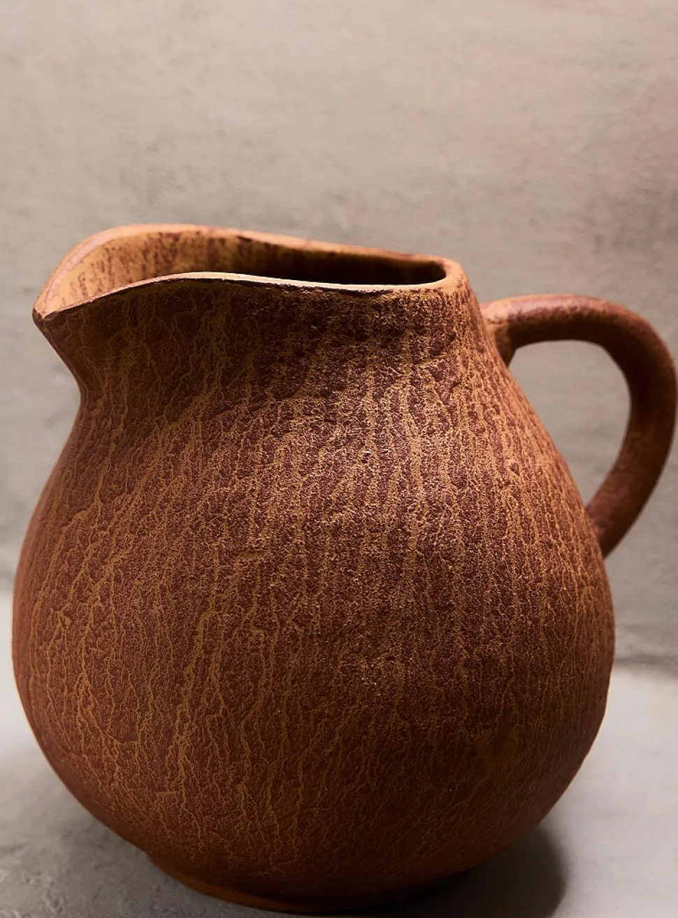 Grooved terracotta jug vase
