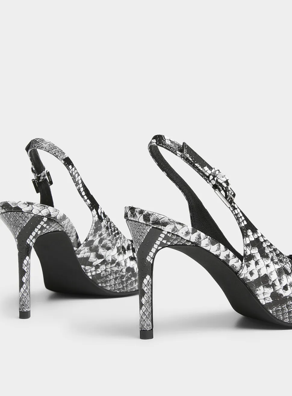 Kienna snakeskin leather slingback pumps