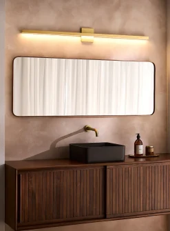 Large slender golden sconce
