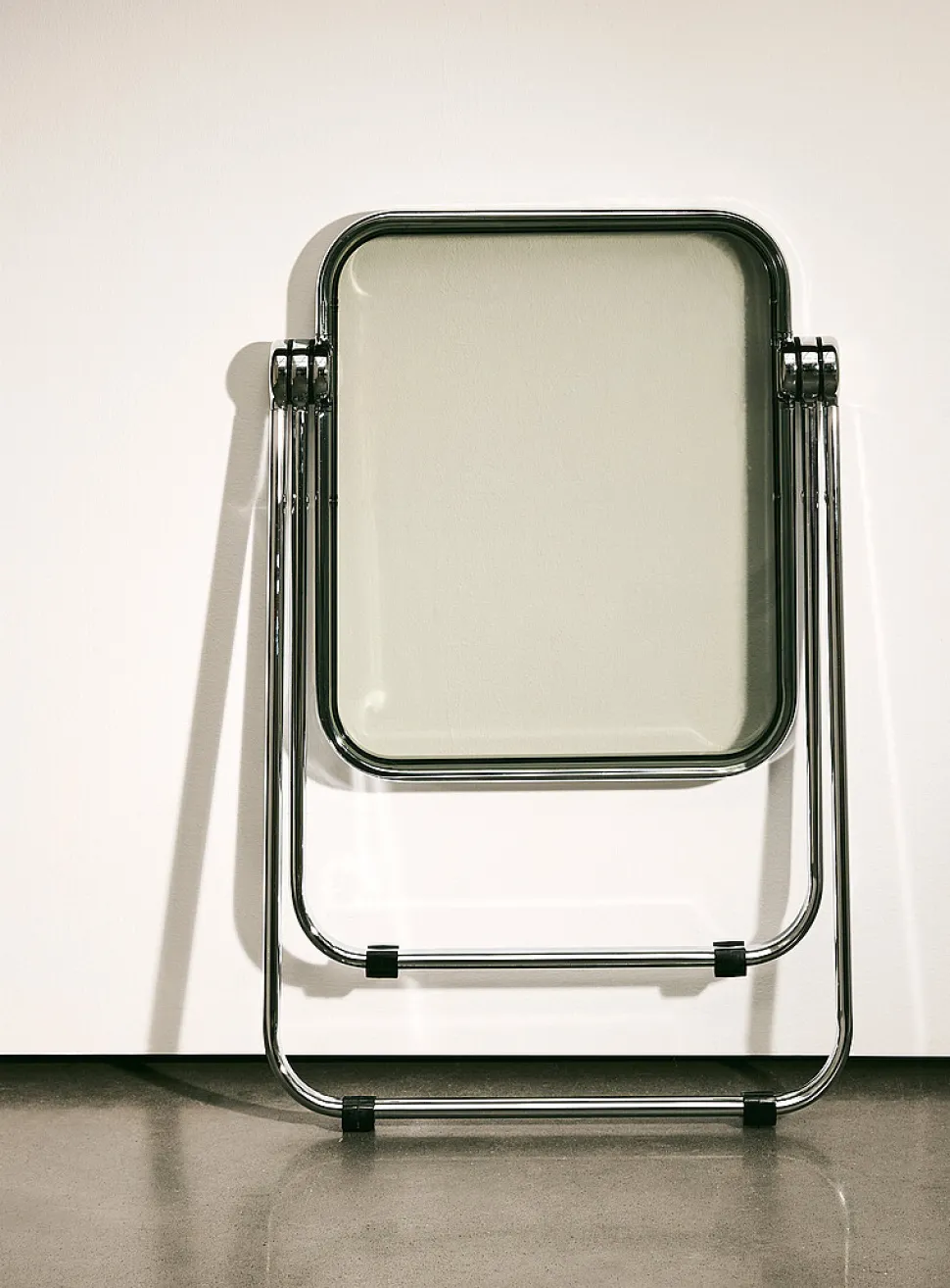 Metal and polyethylene folding accent table
