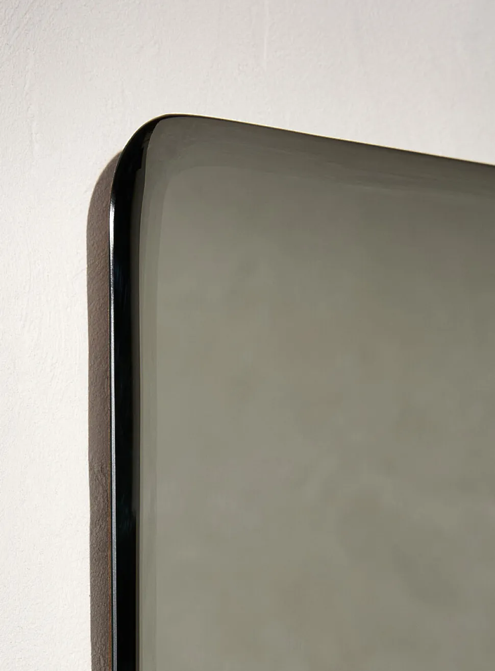 Minimalist frameless mirror