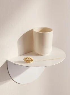Minimalist half-moon wall shelf