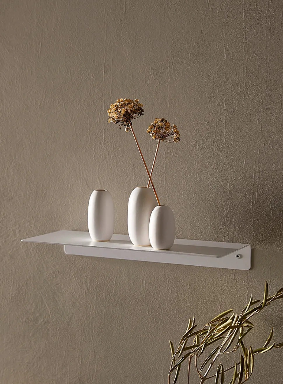 Minimalist steel wall shelf