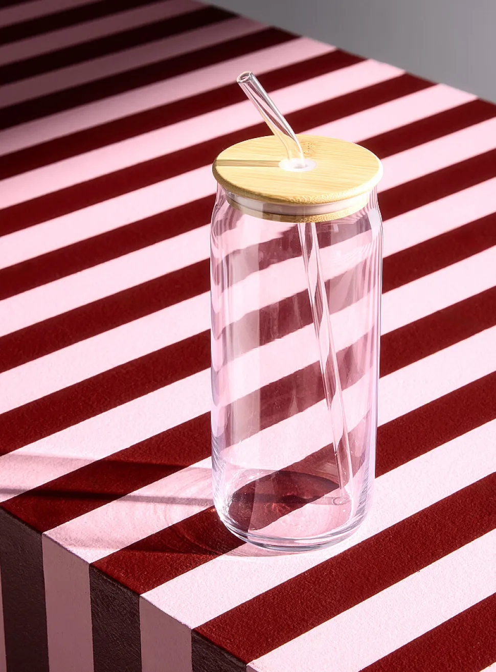 Minimalist tall glass with straw