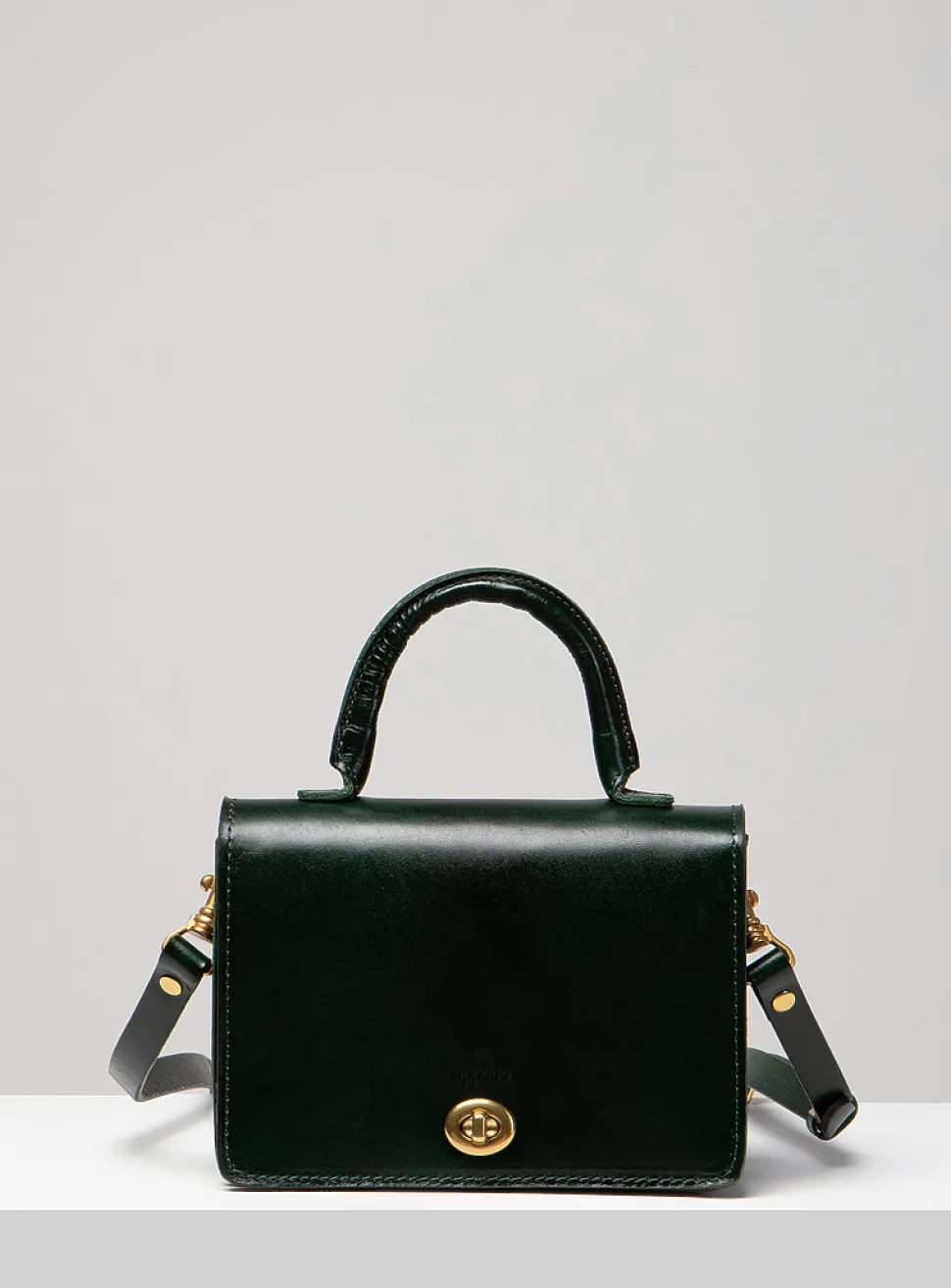 Minimalist Turn-loc closure handbag
