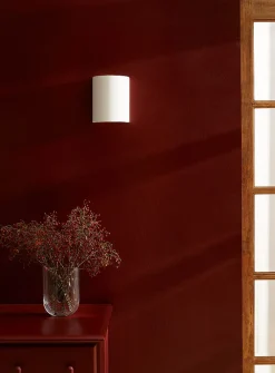 Minimalist white iron wall sconce
