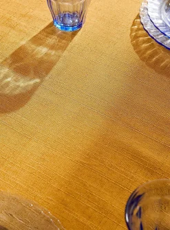 Mustard yellow textured tablecloth