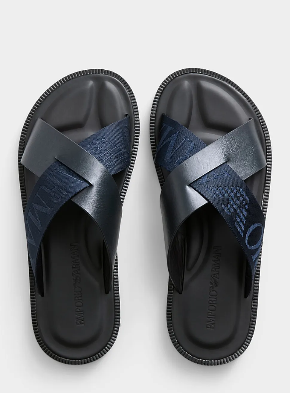 Navy blue leather crossed-strap sandals