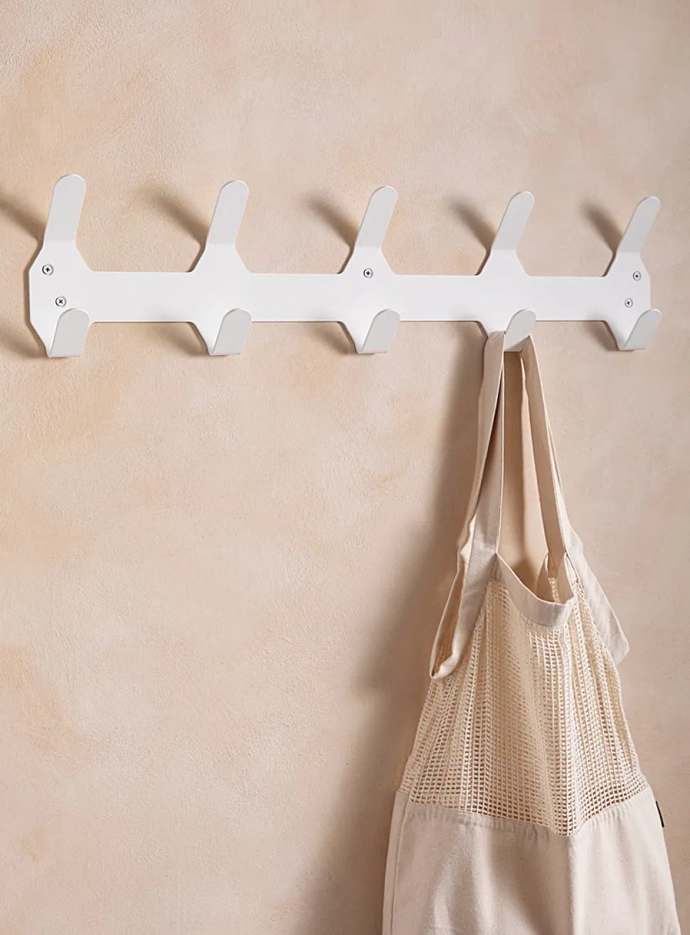 Painted aluminum monochromatic wall-mounted coat rack