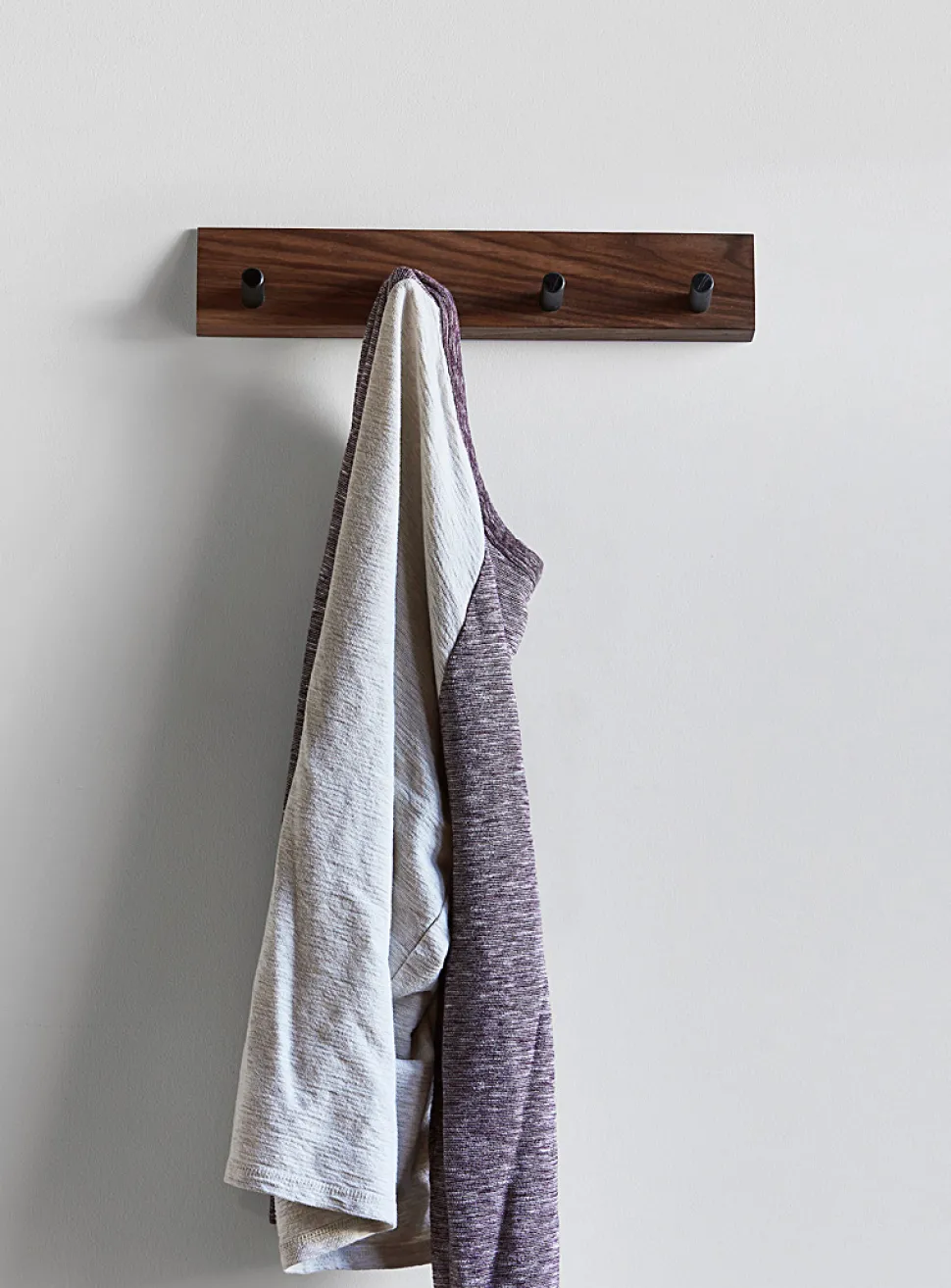 Pyramid four peg hook wall rack