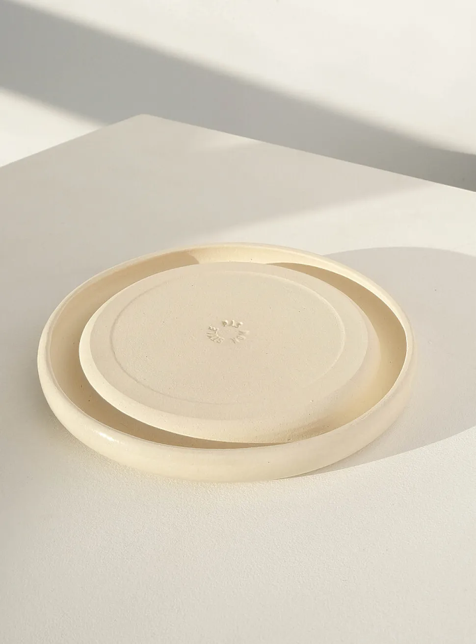 Rounded edge plate