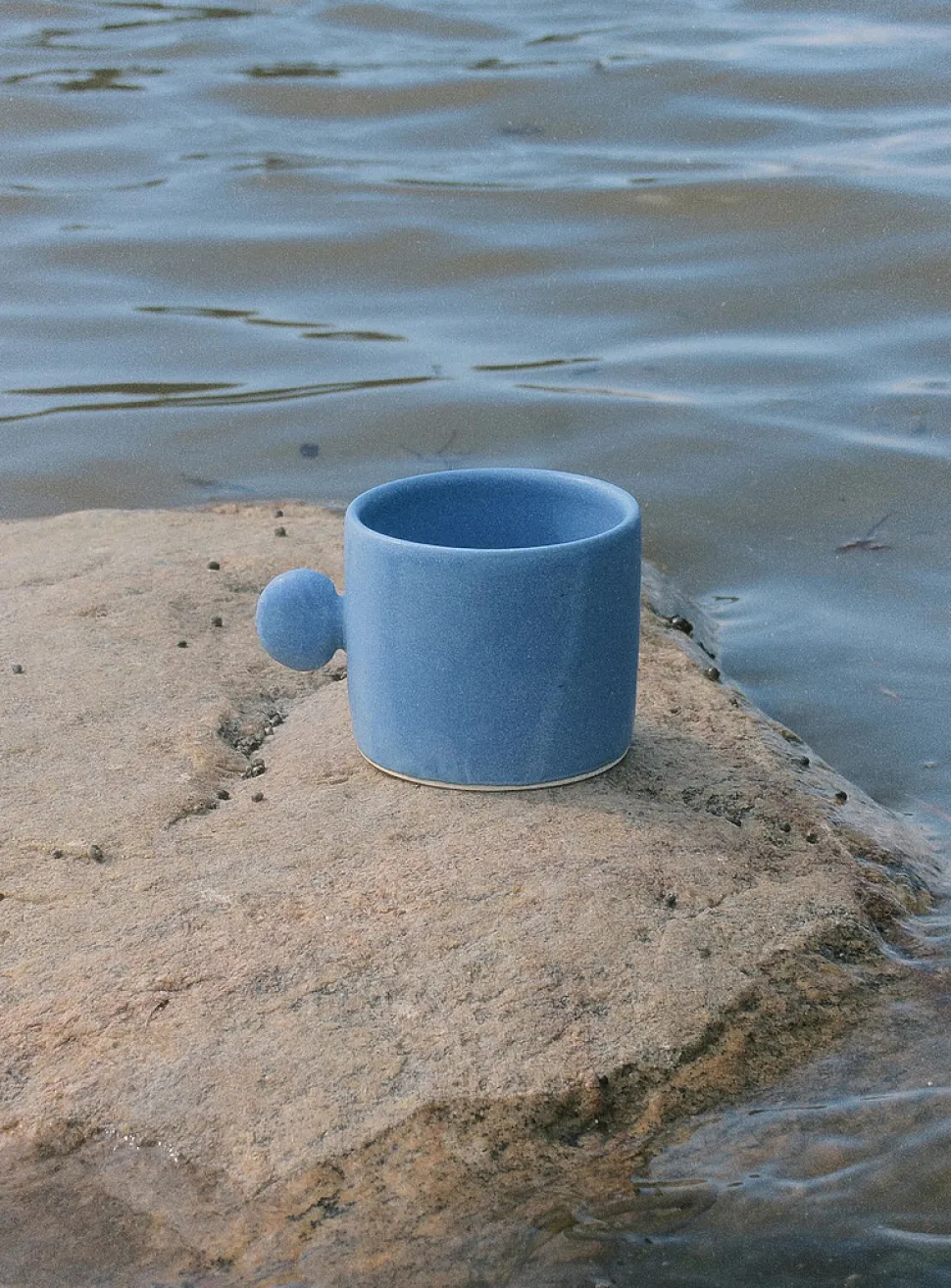 Seashell handle ceramic mug