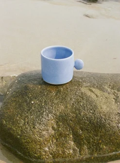 Seashell handle ceramic mug