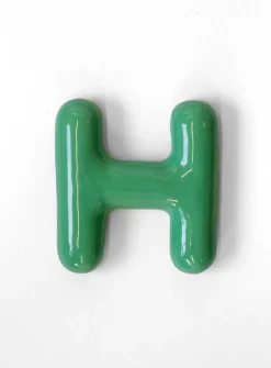 Semiporcelain letter H wall ornament