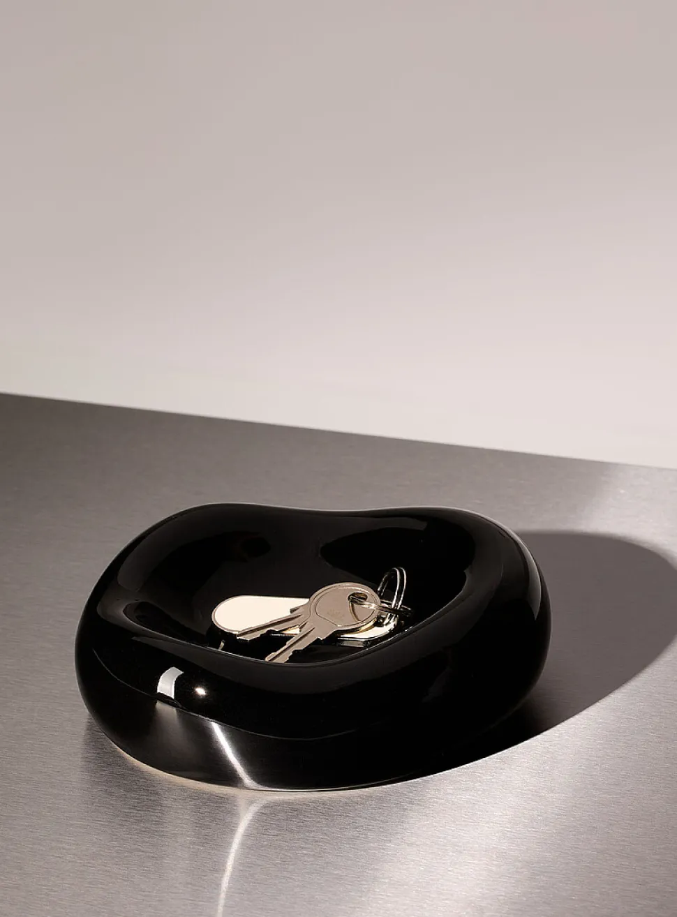 Small black rounded tray