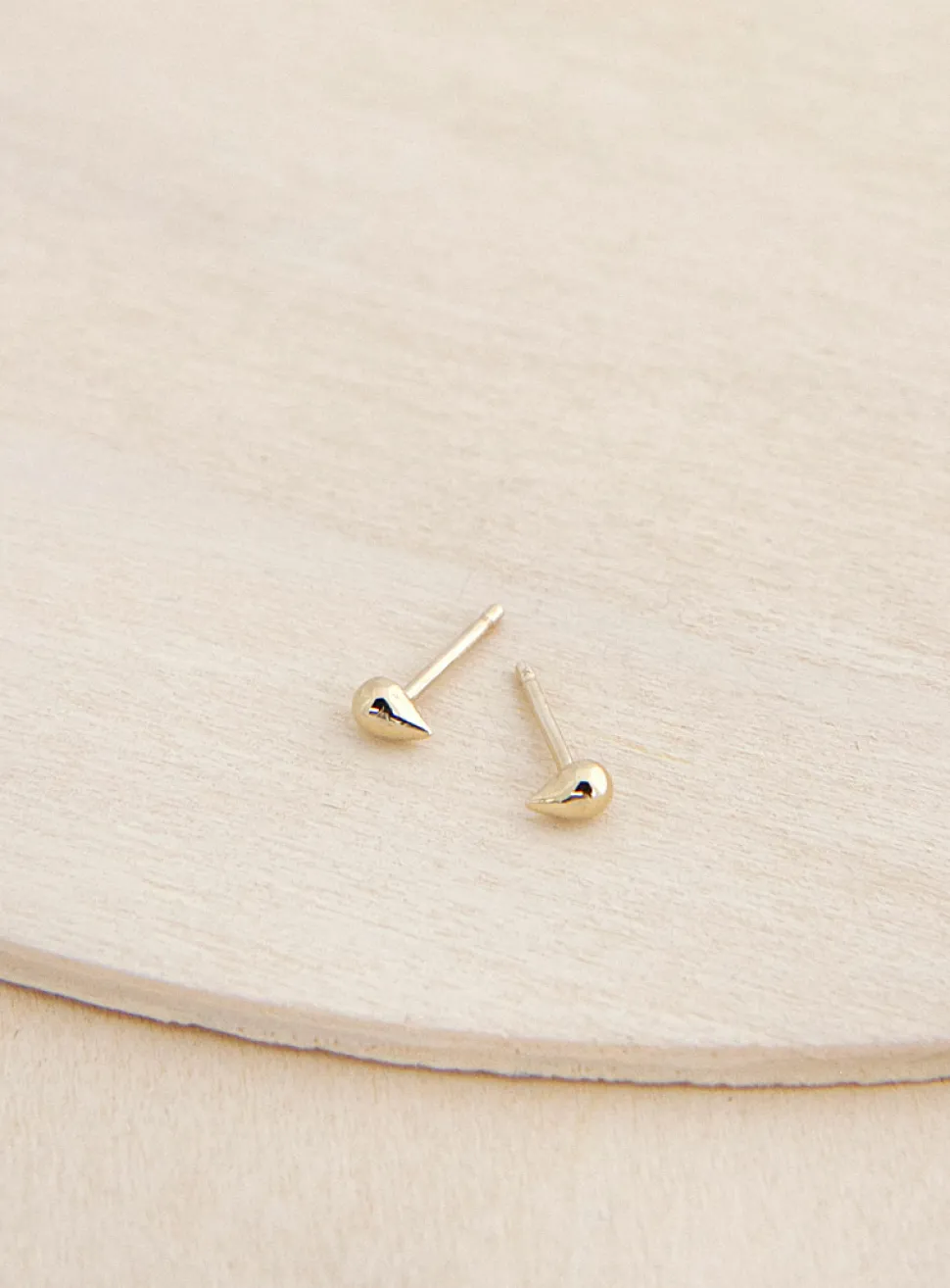 Solid gold paisley earrings