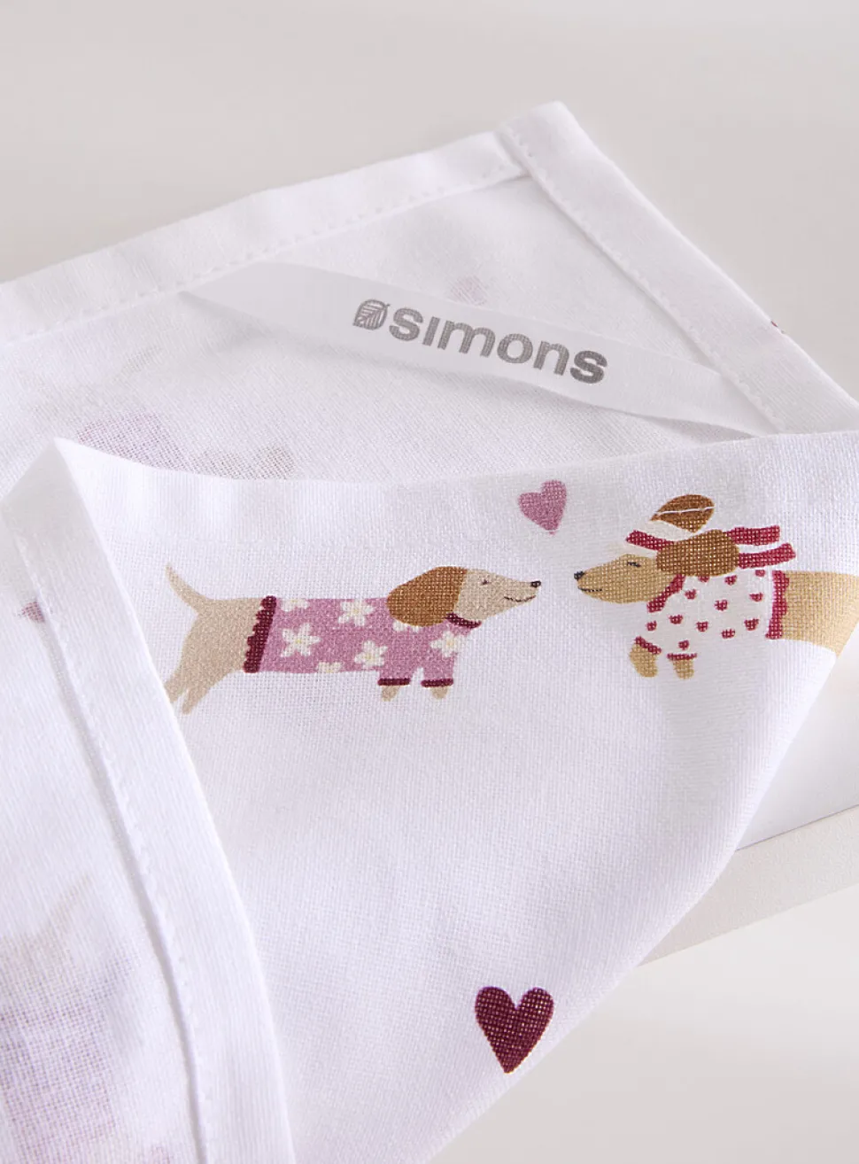 Stylized dachshunds tea towel