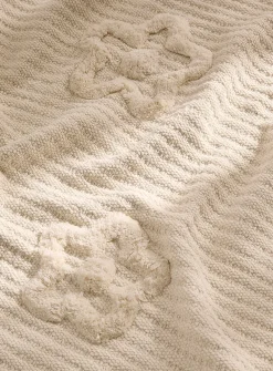 Tufted flowers woven throw